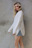 Soft and cozy oversized sweater in ivory S-L
