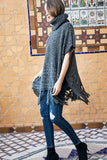 Warm & Cozy turtleneck poncho with fringe accent in charcoal