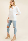Ivory top with criss-cross neckline in sizes S-L