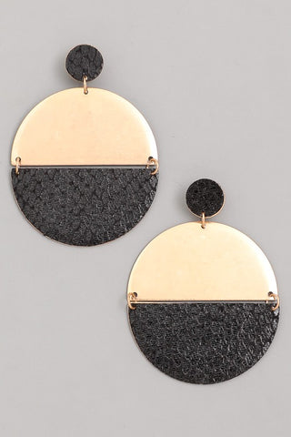 Round gold earrings with black accent